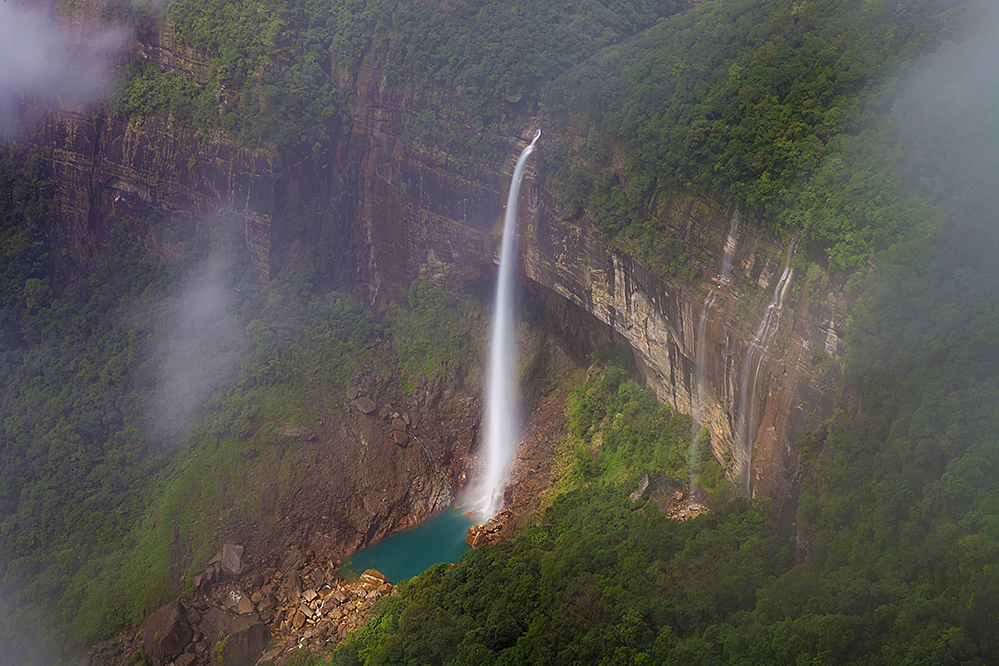 A misty morning at Nohkalikai Falls in Cherrapunji, Meghalaya (Photo by Mahesh / Getty Images)